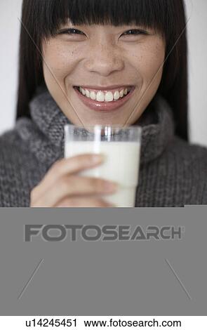 Mid-Adult Woman Drinking Milk View Large Photo Image Stock Image - Mid-Adult Woman Drinking Milk. Fotosearch