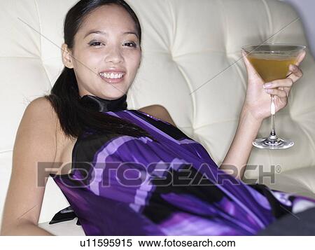 Mid-Adult Woman Having Cocktail View Large Photo Image Stock Photography - Mid-Adult Woman Having Cocktail. Fotosearch