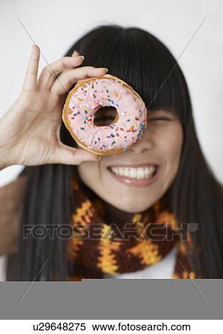 Mid-Adult Woman Looking Through Donut View Large Photo Image Stock Photography - Mid-Adult Woman Looking Through Donut. Fotosearch