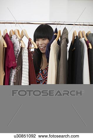 Mid Adult Woman Shopping Clothes View Large Photo Image Stock Image - Mid Adult Woman Shopping Clothes. Fotosearch