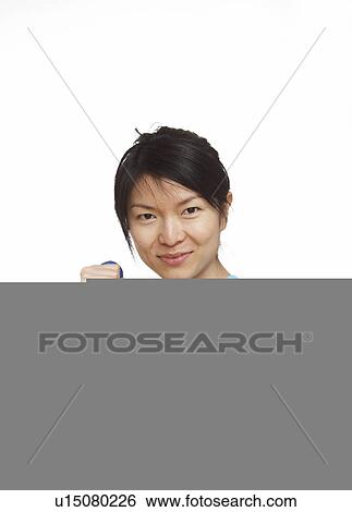 Mid-Adult Woman Working Out with Dumbbells View Large Photo Image Stock Photograph - Mid-Adult Woman Working Out with Dumbbells. Fotosearch