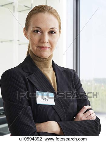 Stock Image - Portrait of Mid-Adult Businesswoman. Fotosearch