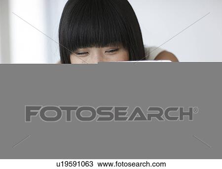 Woman Looking at Newton's Cradle View Large Photo Image Stock Image - Woman Looking at Newton's Cradle. Fotosearch