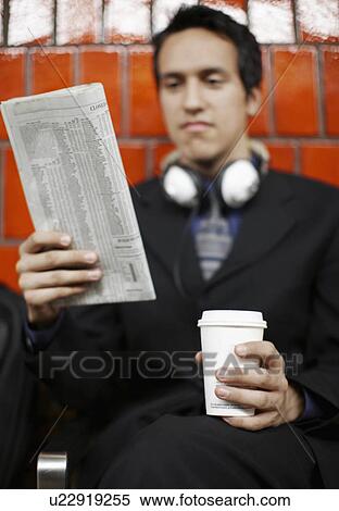 Young Businesswoman Reading Newspaper View Large Photo Image Stock Photography - Young Businesswoman Reading Newspaper. Fotosearch