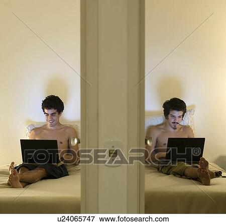 2 brothers chatting in adjacent rooms View Large Photo Image Stock Photo - 2 brothers chatting in adjacent rooms. Fotosearch