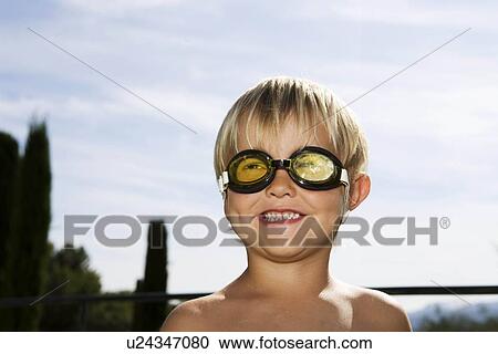 2 wearing goggles View Large Photo Image Stock Image - 2 wearing goggles. Fotosearch