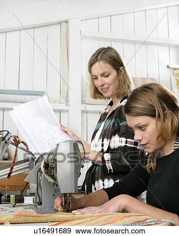 2 women at work View Large Photo Image Stock Photo - 2 women at work. Fotosearch