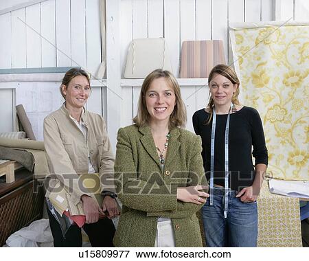 Stock Photo - 3 women small business team. Fotosearch