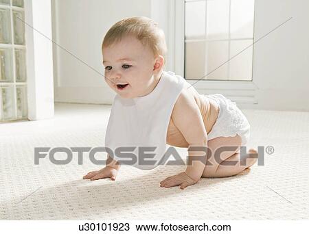A baby crawling View Large Photo Image Stock Image - A baby crawling. Fotosearch