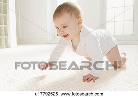 A baby crawling View Large Photo Image Stock Photography - A baby crawling. Fotosearch