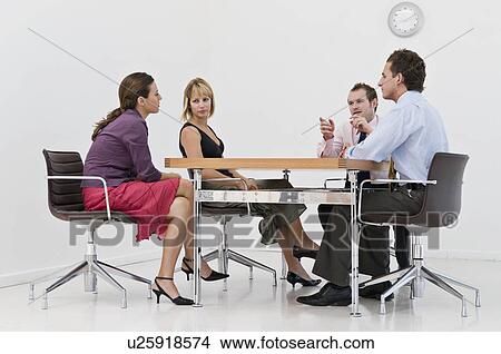 A business meeting. View Large Photo Image Picture - A business meeting.. Fotosearch
