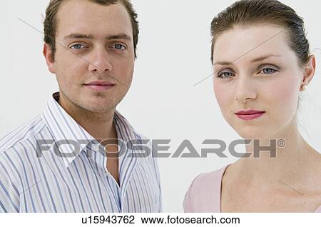 Stock Image - A head shot of a business couple.. Fotosearch