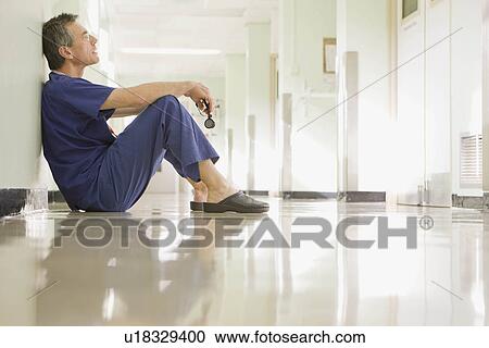 A medical doctor resting View Large Photo Image Stock Image - A medical doctor resting. Fotosearch
