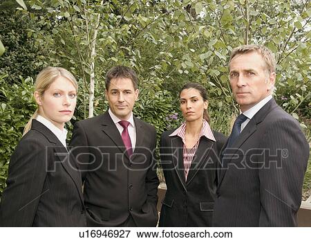 Stock Photo - A portrait of a business group.. Fotosearch