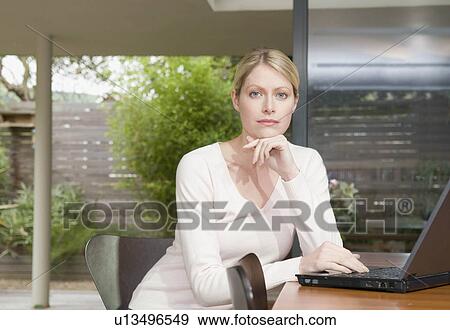 Stock Photo - A portrait of a business woman. Fotosearch