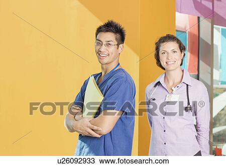 A portrait of a doctor and a nurse View Large Photo Image Stock Image - A portrait of a doctor and a nurse. Fotosearch
