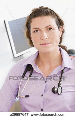 A portrait of a female doctor View Large Photo Image Stock Photo - A portrait of a female doctor. Fotosearch