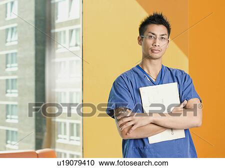 Stock Image - A portrait of a male nurse. Fotosearch
