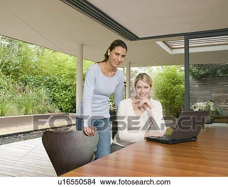 A portrait of two business woman. View Large Photo Image Picture - A portrait of two business woman.. Fotosearch