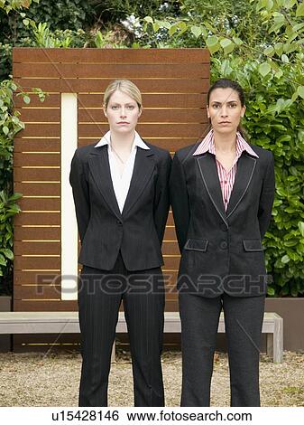 A portrait of two business woman. View Large Photo Image Stock Photograph - A portrait of two business woman.. Fotosearch