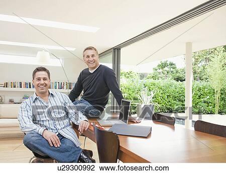 Stock Image - A portrait of two businessmen. Fotosearch