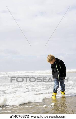 Boy on Beach View Large Photo Image Stock Image - Boy on Beach. Fotosearch