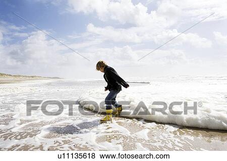Stock Photo - Boy on Beach. Fotosearch