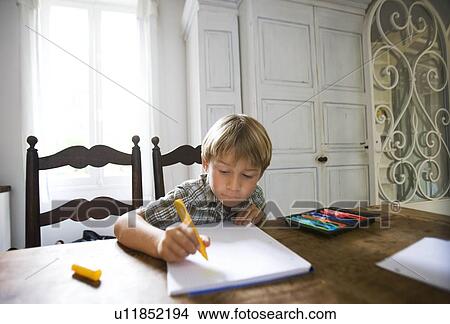 Picture - Boy with drawing. Fotosearch