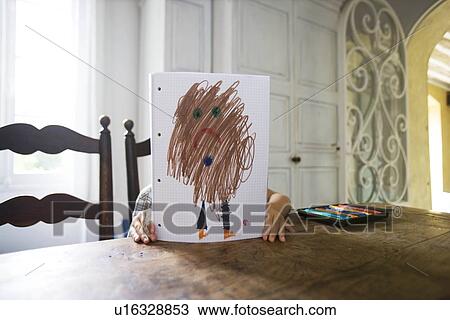 Stock Image - Boy with drawing. Fotosearch