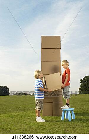 boys building tower View Large Photo Image Stock Photograph - boys building tower. Fotosearch