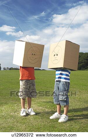 boys with boxes over heads View Large Photo Image Stock Image - boys with boxes over heads. Fotosearch
