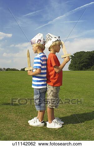 Stock Image - boys with swords. Fotosearch
