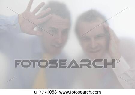 Business men behind a screen View Large Photo Image Stock Image - Business men behind a screen. Fotosearch