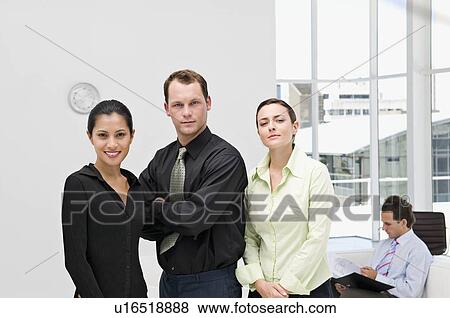 Stock Photo - Business people in an office. Fotosearch