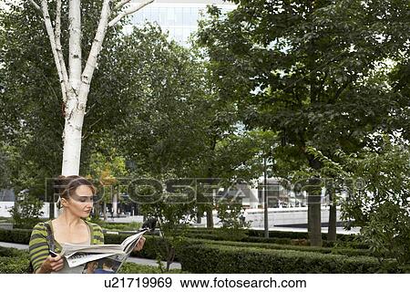Stock Photo - Business woman on lunch break. Fotosearch