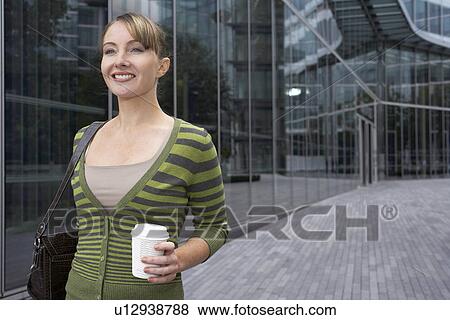 Stock Photo - Business woman on the move. Fotosearch