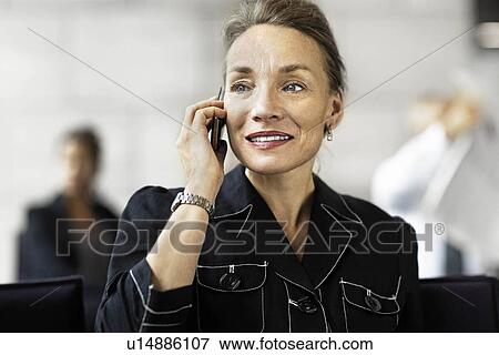 Business woman on the phone View Large Photo Image Stock Photo - Business woman on the phone. Fotosearch