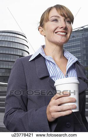 Stock Image - Business woman outside. Fotosearch
