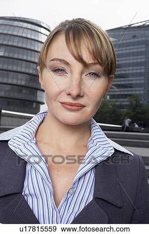 Stock Photo - Business woman outside. Fotosearch