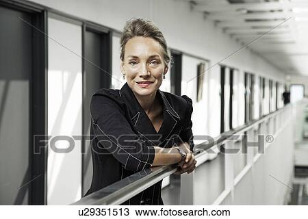 Business woman smiling View Large Photo Image Stock Image - Business woman smiling. Fotosearch