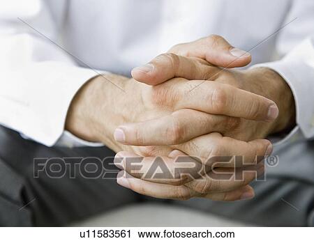 Stock Image - Close-up of hands. Fotosearch