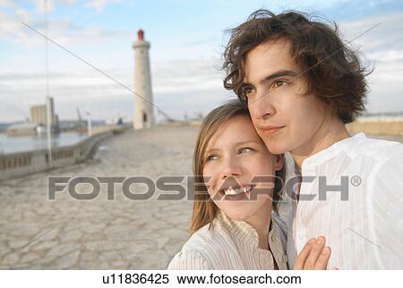 couple admiring sunset on pier View Large Photo Image Stock Photography - couple admiring sunset on pier. Fotosearch