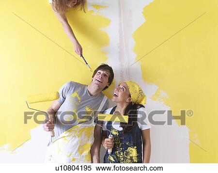 Couple messing around with paint. View Large Photo Image Stock Photography - Couple messing around with paint.. Fotosearch