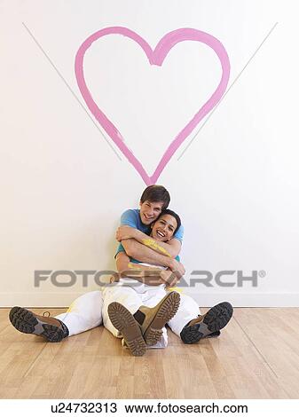 Couple with heart painting. View Large Photo Image Stock Image - Couple with heart painting.. Fotosearch
