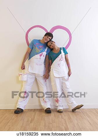 Couple with heart painting. View Large Photo Image Stock Photography - Couple with heart painting.. Fotosearch
