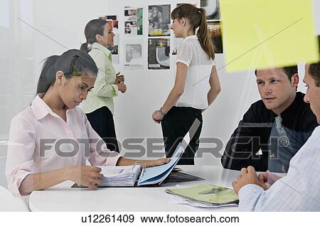Stock Photo - Creative business people in a meeting. Fotosearch