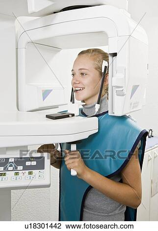 Dental patient getting an x-ray taken View Large Photo Image Stock Image - Dental patient getting an x-ray taken. Fotosearch