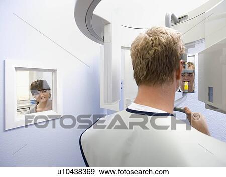 Dental patient having x-ray taken View Large Photo Image Stock Photo - Dental patient having x-ray taken. Fotosearch
