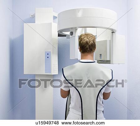 Dental patient having x-ray taken View Large Photo Image Stock Photo - Dental patient having x-ray taken. Fotosearch