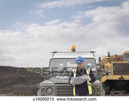 Ecologist In Front Of Car View Large Photo Image Stock Photography - Ecologist In Front Of Car. Fotosearch
